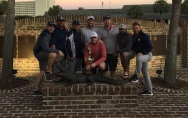Eight males golfers posing for picture at Myrtle Beach
