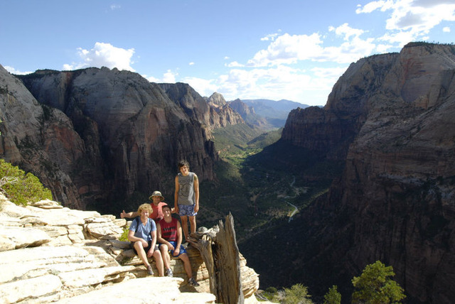 Four hikers on Angels Landing trail at Zion National Park