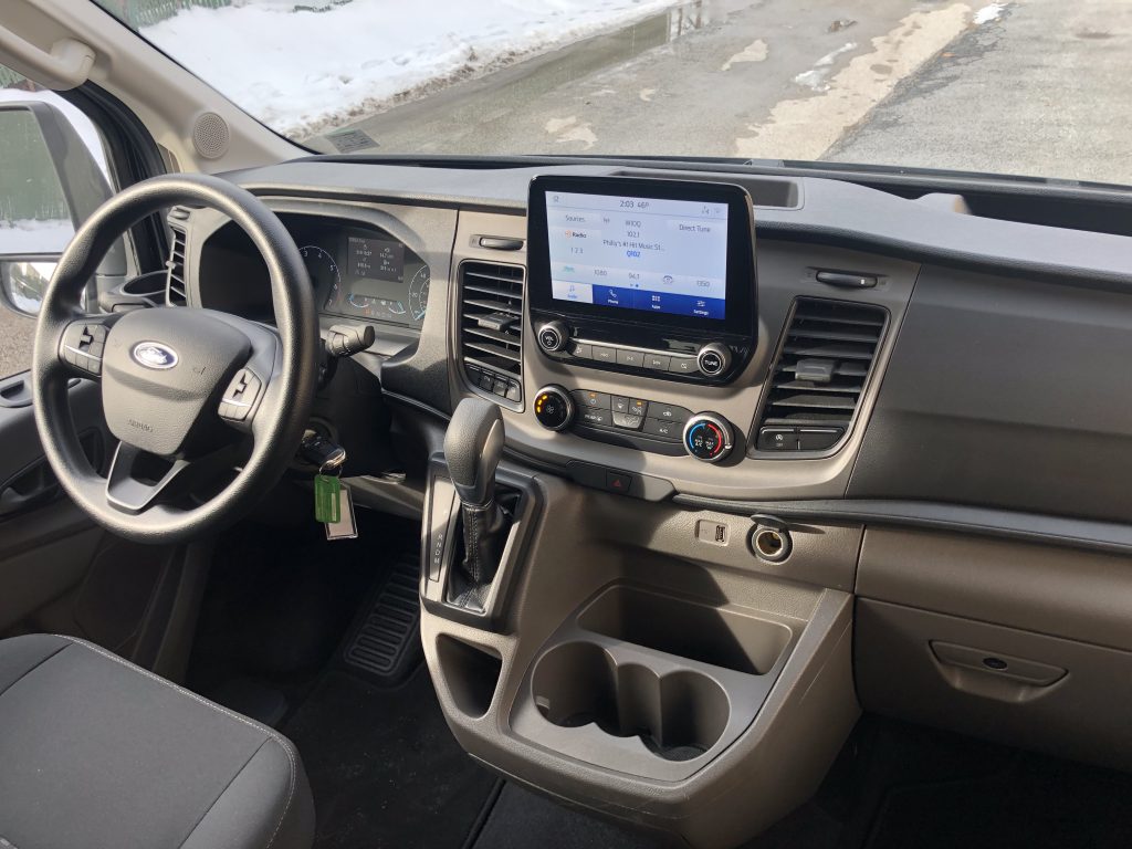 Front seat and dashboard of a Ford 15 Passenger Van