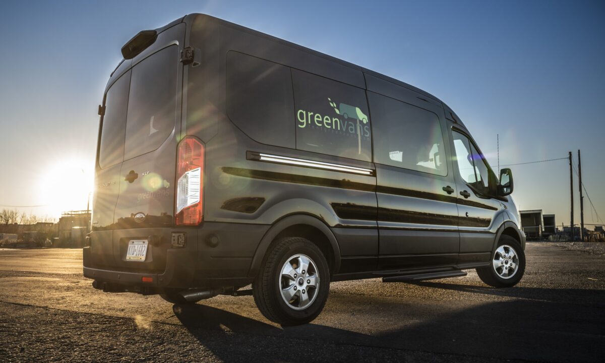 Side view of Greenvans passenger van