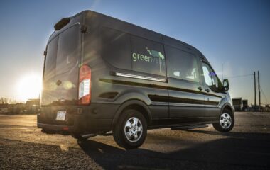 Side view of Greenvans passenger van