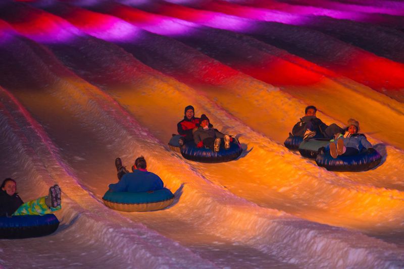 Families snow tubing in the Poconos