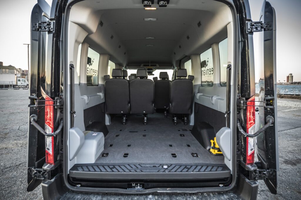 Interior view of rear of Ford 15 Passenger Medium Roof Transit 350 XLT with back two rows removed