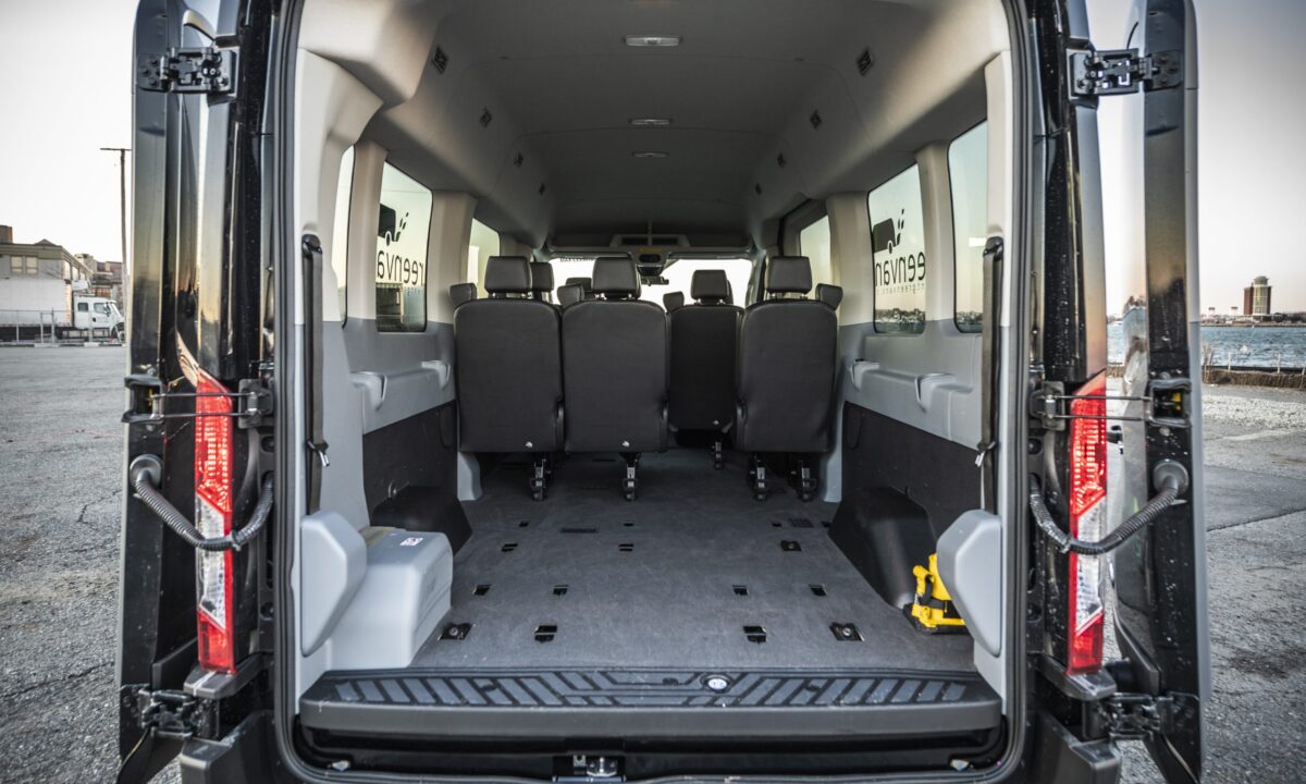 Interior view of rear of Ford 15 Passenger Medium Roof Transit 350 XLT with back two rows removed