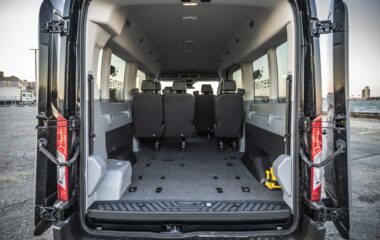 Interior view of rear of Ford 15 Passenger Medium Roof Transit 350 XLT with back two rows removed