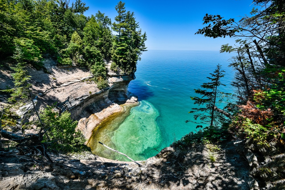 Beautiful clear lake water with visible rock formations