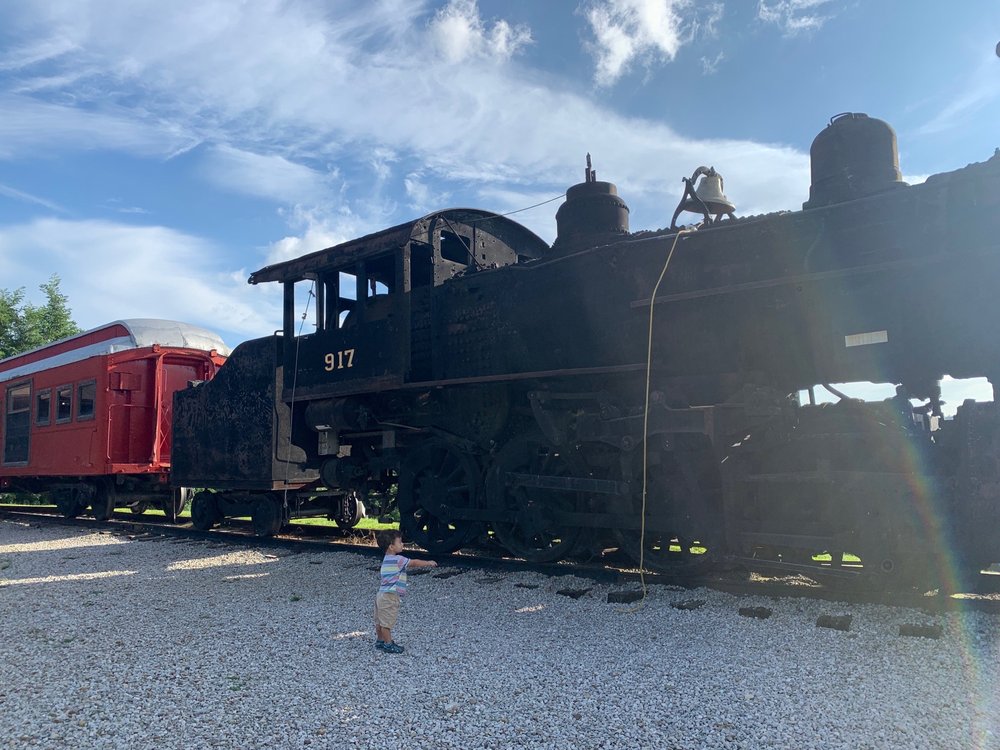 A small child in front of the Buckeye Express Diner, a special restaurant to visit.