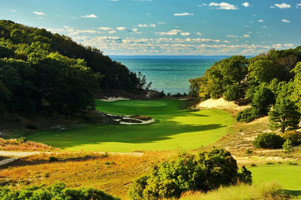 A view of a putting green overlooking Long Island Sound at Friar's Head Golf Course.