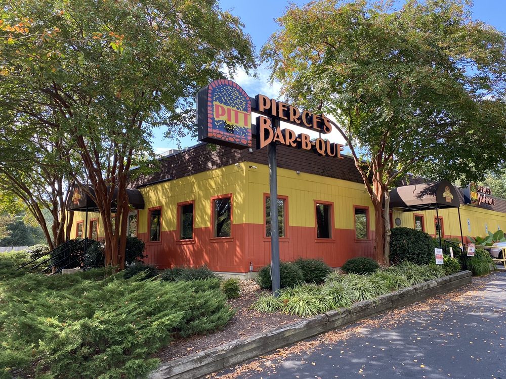 An outside photo of Pierce’s Pitt Bar-B-Que, where the magic happens.