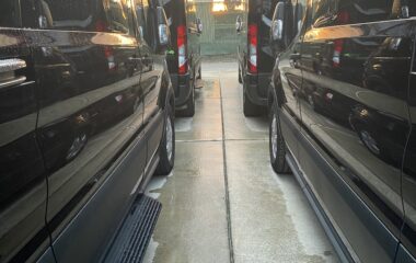 Rows of new 15 passenger Transit Rental vans from Greenvans in Philadelphia.